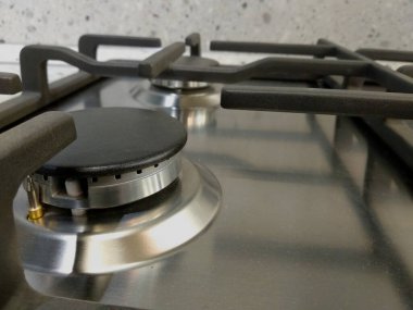 Mutfak arka planında modern mutfak sobası