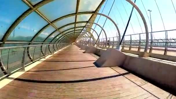 Movement through the bright tunnel in a sunny day — Stock Video