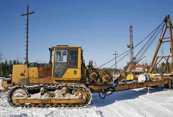 Tractor working on the rig floor — Stock Photo, Image