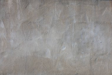 Büyük gri beton duvar, yaşla yıpranmış. Arkaplan.