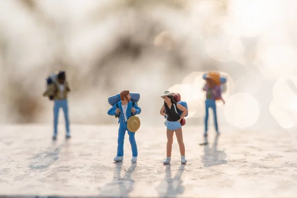 Miniature people : Backpacker Traveling , using as travel adventure concept.