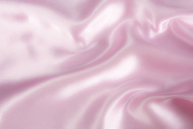 Soyut pembe ipek kumaş dokusu arka planı. Kumaş yumuşak dalga. Saten hazineleri.