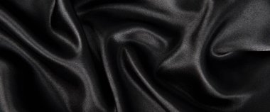 Soyut siyah ipek kumaş dokusu arkaplanı. Kumaş yumuşak dalga. Saten hazineleri.