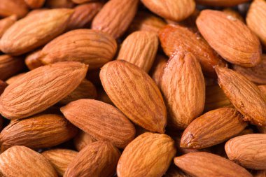 Lezzetli kavrulmuş tatlı badem fındık arka planı