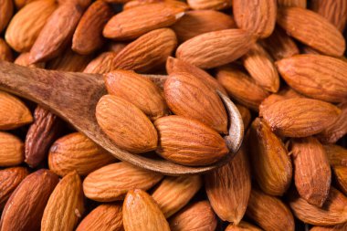 Lezzetli kavrulmuş tatlı badem fındık arka planı