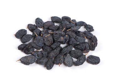 Dried black raisins isolated on white background