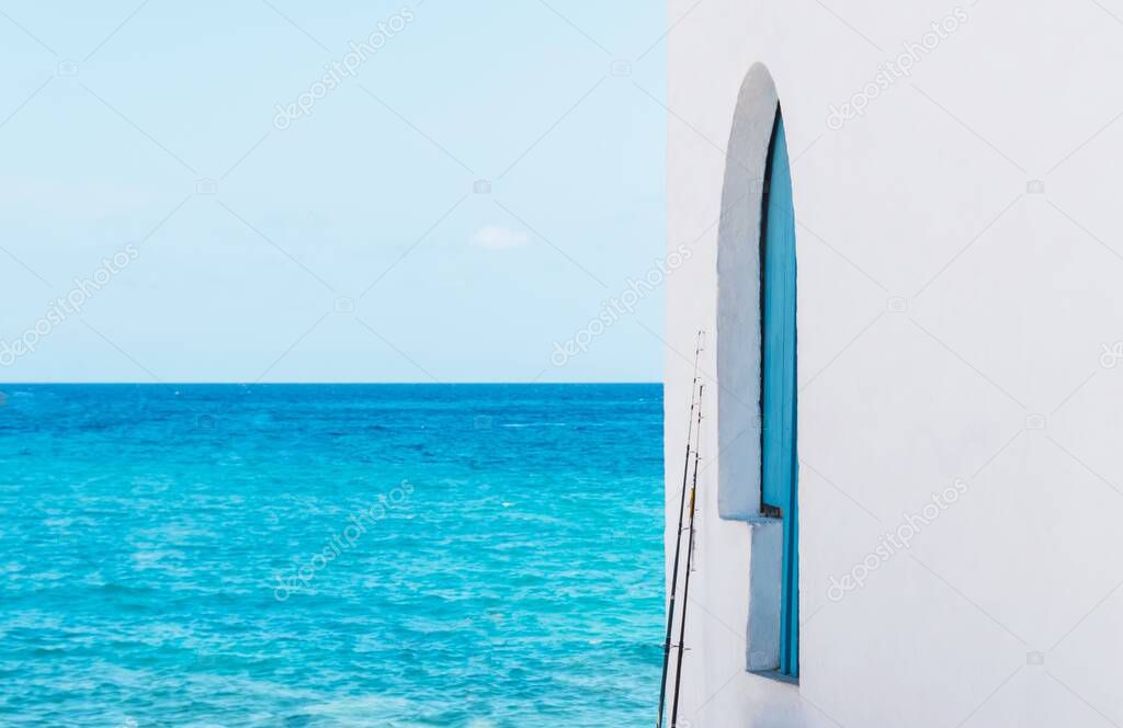 Sea views from the white house with blue door in Cala Barraca, Javea, Alicante province, Spain