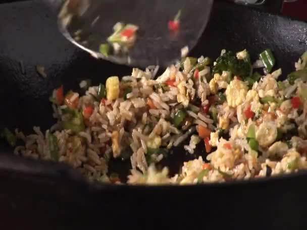 Cooking vegetable rice — Stock Video