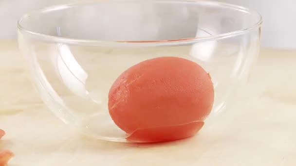 Tomato removed from a bowl — Stock Video