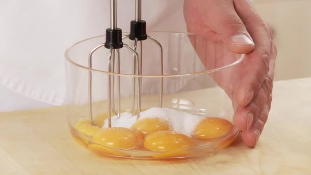 Whisking egg yolks and sugar — Stock Video