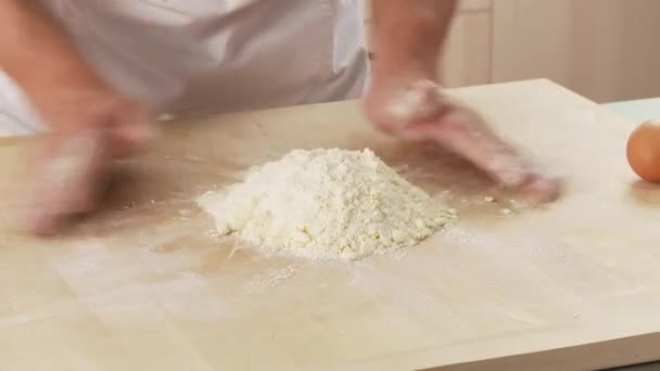 A well being made in a flour — Stock Video