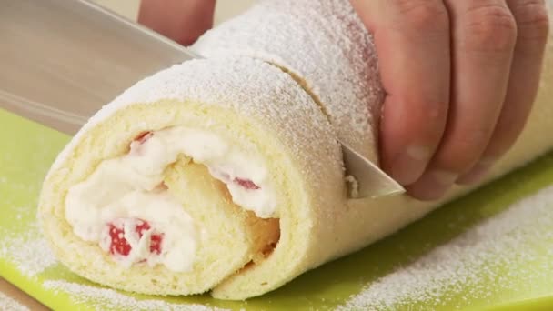 Strawberry roll being sliced — Stock Video