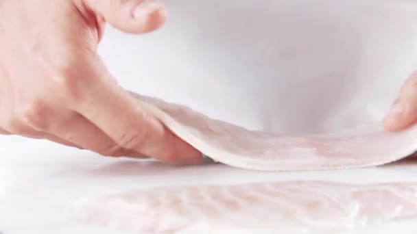 Fish fillet being skinned — Stock Video