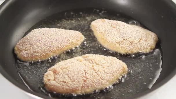 Chicken breasts being fried — Stock Video