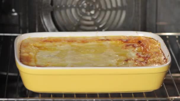 Lasagne in an oven — Stock Video