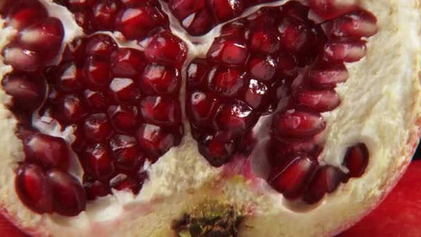 Whole and piece of pomegranates — Stock Video