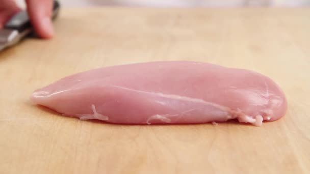 Chicken breast being sliced — Stock Video