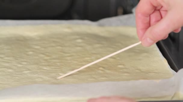 Cake being tested with stick — Stock Video