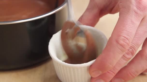 Chocolate souffle being poured — Stock Video