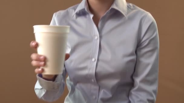 Young woman drinking coffee — Stock Video