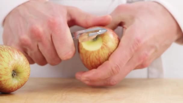 Apple being peeled in a spiral shape — Stock Video