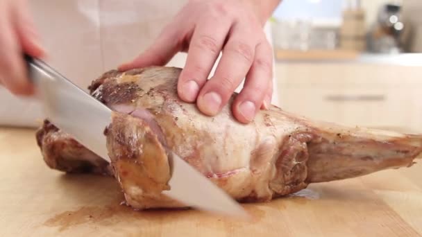 Leg of lamb being sliced — Stock Video