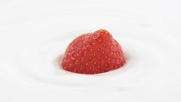 Tasty strawberry in cream — Stock Video