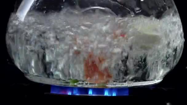 Vegetables falling into water — Stock Video