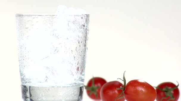 Pouring tomato juice into a glass — Stock Video