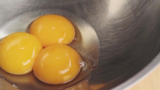 Adding vanilla to eggs — Stock Video