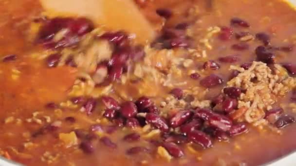 Stirring chilli con carne — Stock Video