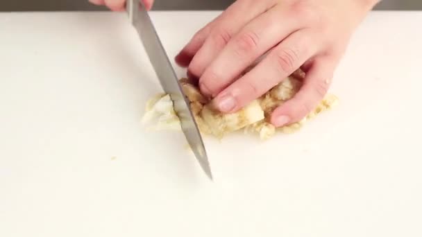 Aubergine flesh being chopped — Stock Video