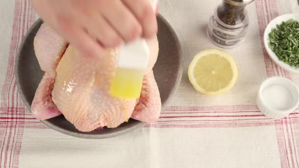 A whole chicken being brushed — Stock Video