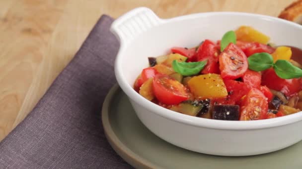 Ratatouille in a white bowl — Stock Video