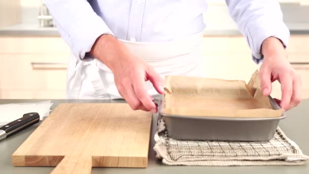 Butter fudge being knocked out of a tray — Stock Video