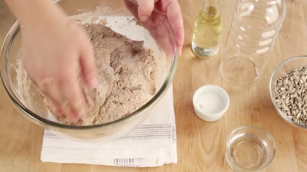 Bread dough being covered — Stock Video