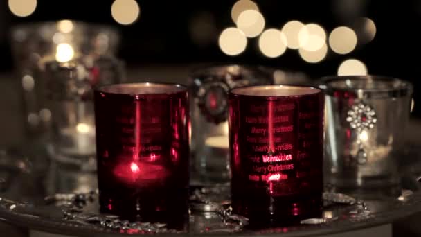 Tealights with Christmas decorations — Stock Video