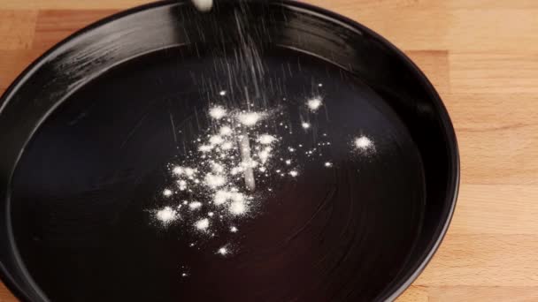 Dish being sprinkled with flour — Stock Video