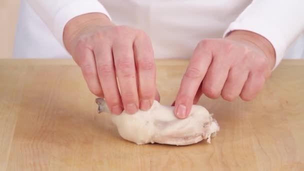 Chicken being removed from the bone — Stock Video