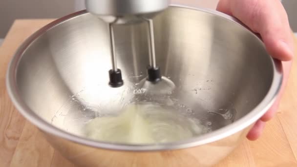 Beating egg white stiffly — Stock Video