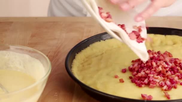 Egg topping being poured over pastry base — Stock Video