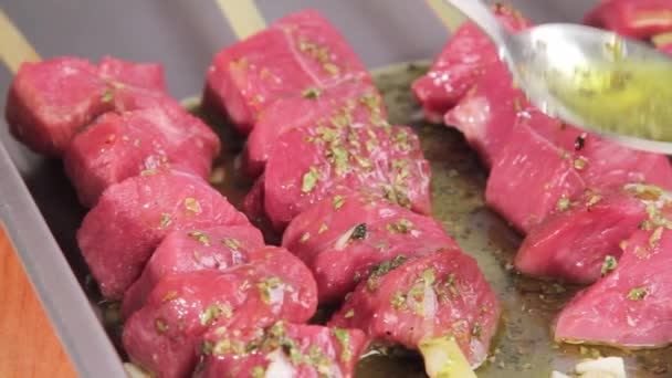 Lamb kebabs being drizzled — Stock Video