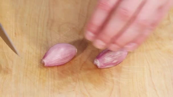 Shallots being chopped on cutting board — Stock Video