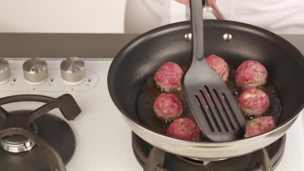 Meat balls being fried — Stock Video