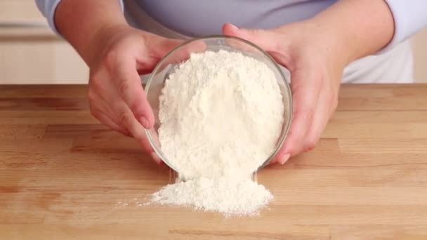 Well being made in a pile of flour — Stock Video