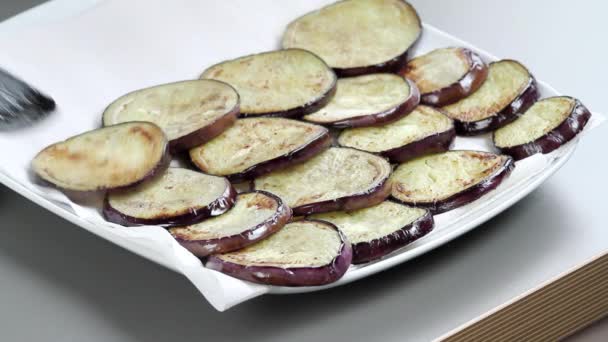 Aubergine slices being dried — Stock Video