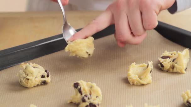 Dough being placed on a baking tray — Stock Video