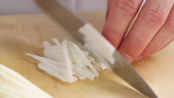 Celeriac being finely chopped — Stock Video