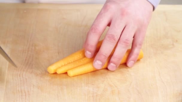 Carrots being chopped — Stock Video