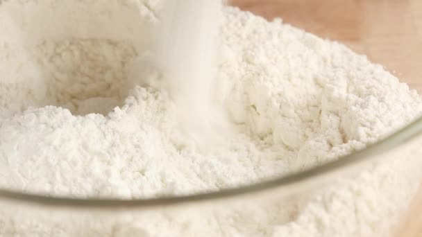 Powder added to flour — Stock Video